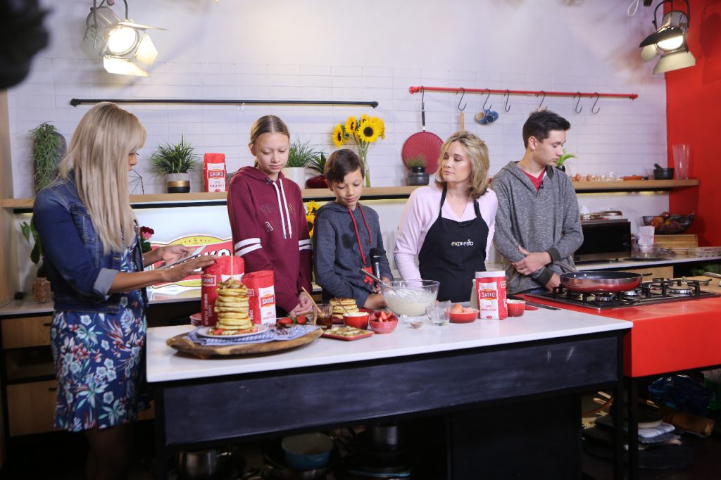 Female entrepreneur, baking extraordinaire and mother of four, Grace Stevens baking with kids