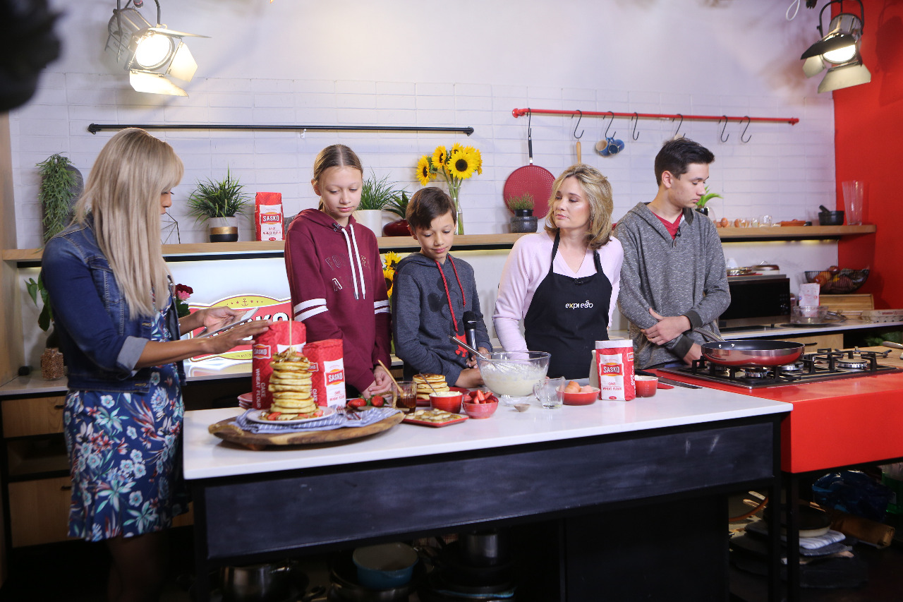 Female entrepreneur, baking extraordinaire and mother of four, Grace Stevens baking with kids