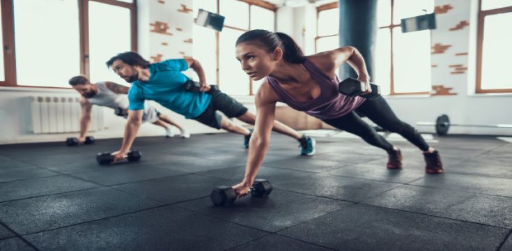 athletes-floor-dumbbell-lift-with-one-hand