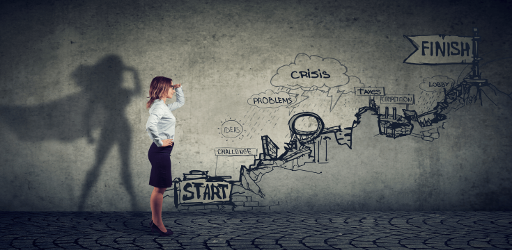 business-woman-looking-in-the-distance-of-her-goals-and-achieving-her-dreams
