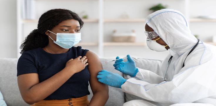 female getting vaccination