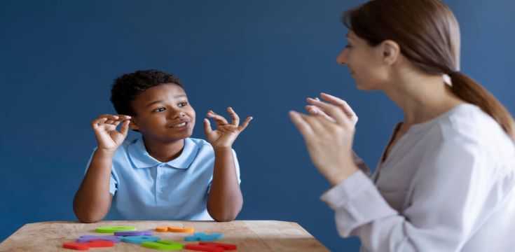 boy-having-occupational-therapy-session-with-psychologist