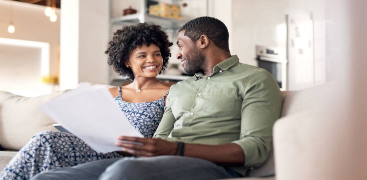couple-talking-about-finances-iStock-1174058012