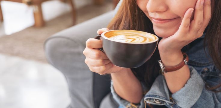 adult-drinking-coffee-stock