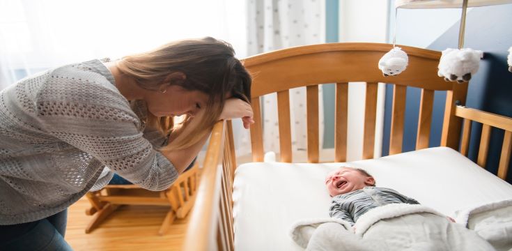 crying baby and mom