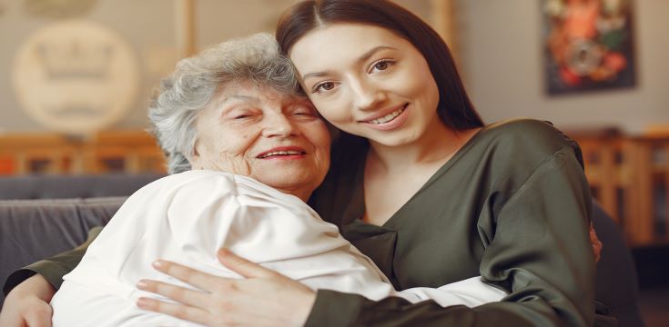 old-woman-in-a-cafe-with-young-granddaughter