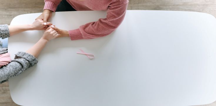 two-people-holding-hands