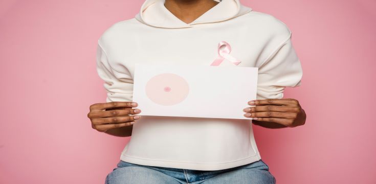 black-female-holding-paper-cancer-banner-image