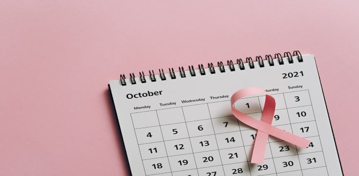 close-up-shot-of-a-pink-ribbon-on-a-calender