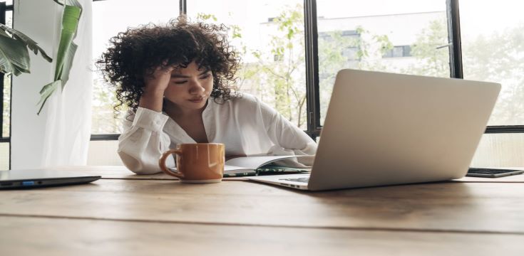 female-at-work-desk-laptop