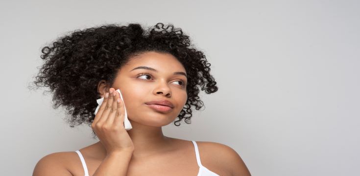 portrait-beautiful-woman-removing-her-make-up-with-tissue