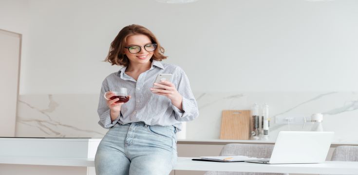 portrait-happy-woman-using-mobile-phone