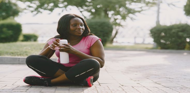 healthy-young-african-woman-outdoors-morning-girl-with-bottle-water