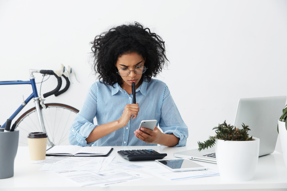 frustrated-young-female-entrepreneur-formal-shirt-eyewear-having-problem