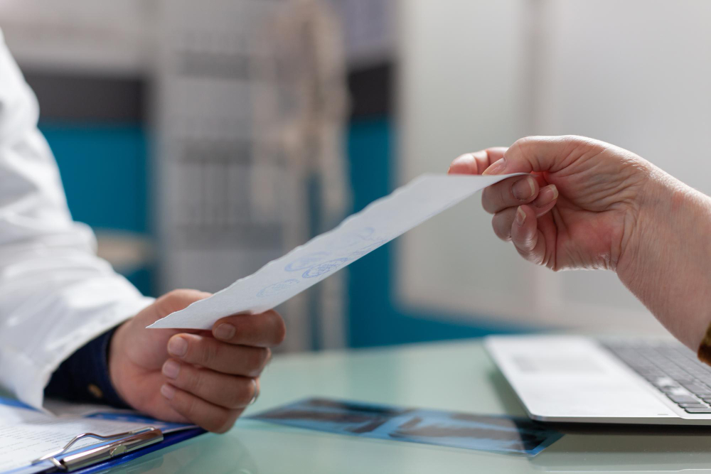 physician-giving-prescription-document-patient-cabinet-after-medical-consultation-medic-holding-checkup-report-give-treatment-retired-person-health-care-office-close-up