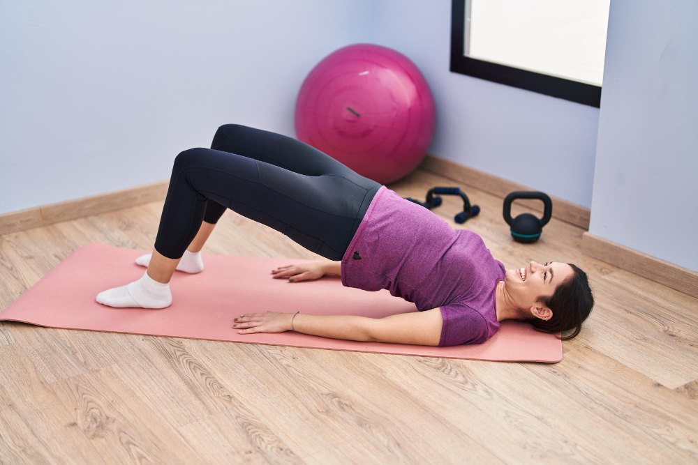 young-woman-smiling-confident-training-abs-exercise-sport-center