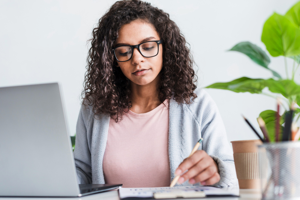 serious-young-female-working-office