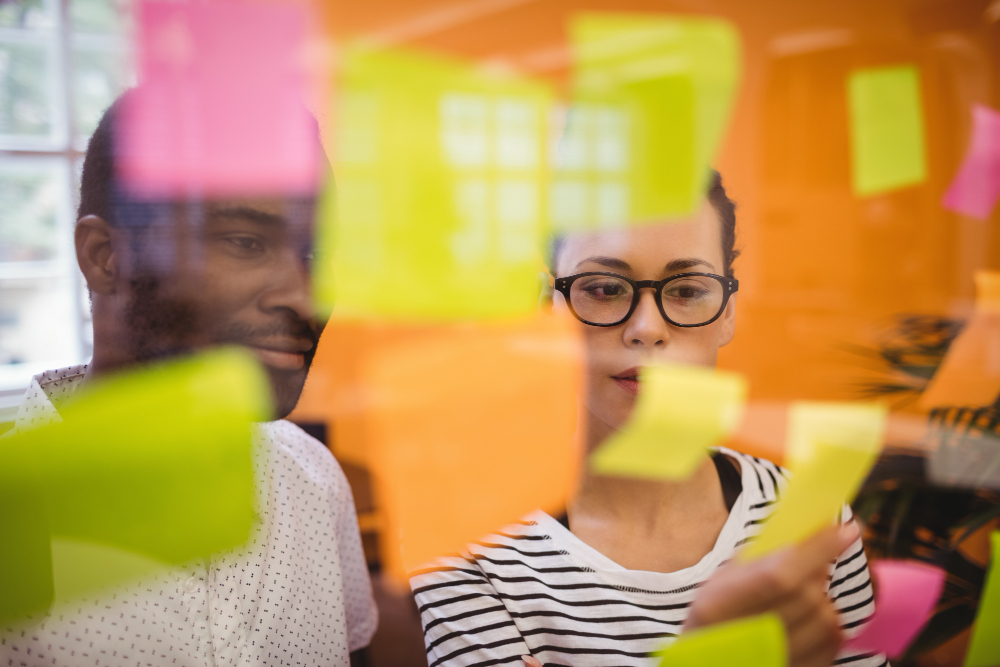 business-executives-reading-sticky-notes