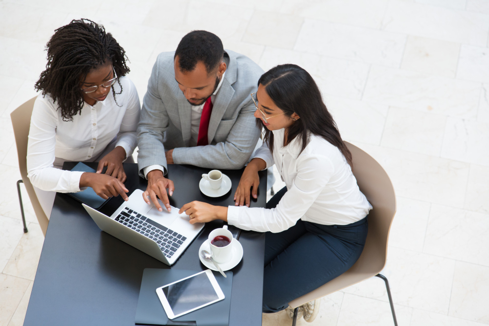 diverse-business-group-working-laptop